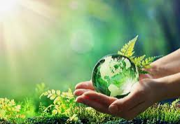 A girl holding a sign that says racism is also a pandemic.