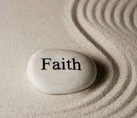 A girl holding a sign that says racism is also a pandemic.