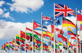 A girl holding a sign that says racism is also a pandemic.